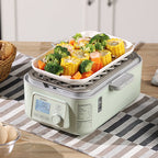 BUYDEEM's Food Steamer with vegetables on a kitchen counter